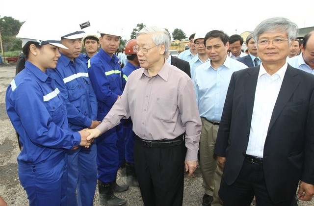 General Secretary Nguyen Phu Trong met with workers of Nui Beo Coal Joint Stock Company in 2013. Photo by Vietnam News Agency.