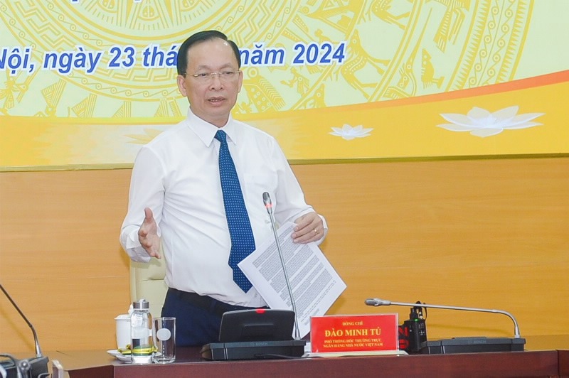  State Bank of Vietnam Deputy Governor Dao Minh Tu chairs the press meet in Hanoi, July 23, 2024. Photo courtesy of SBV.