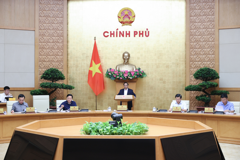 Prime Minister Pham Minh Chinh (center) speaks at a cabinet meeting in Hanoi, July 24, 2024. Photo courtesy of the government’s news portal.