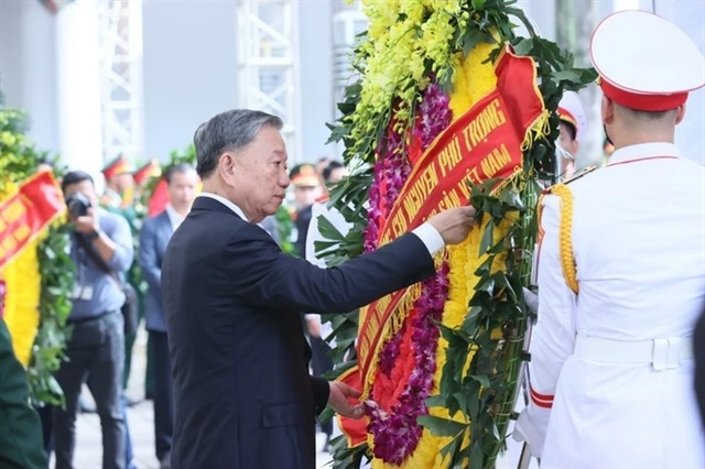 President To Lam, Politburo Member and President, leads the Party Central Committee delegation to pay respects to General Secretary Nguyen Phu Trong. Photo by Vietnam News Agency.