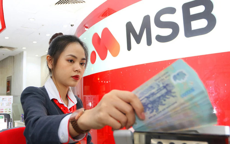  A cashier of Maritime Bank. Photo courtesy of the bank.