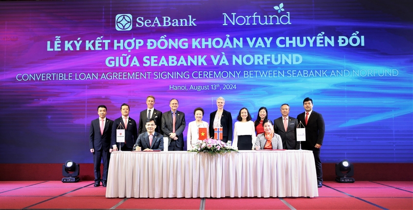 Representatives of SeABank and Norfund sign an agreement in Hanoi on August 13, 2024. Photo courtesy of SeABank.