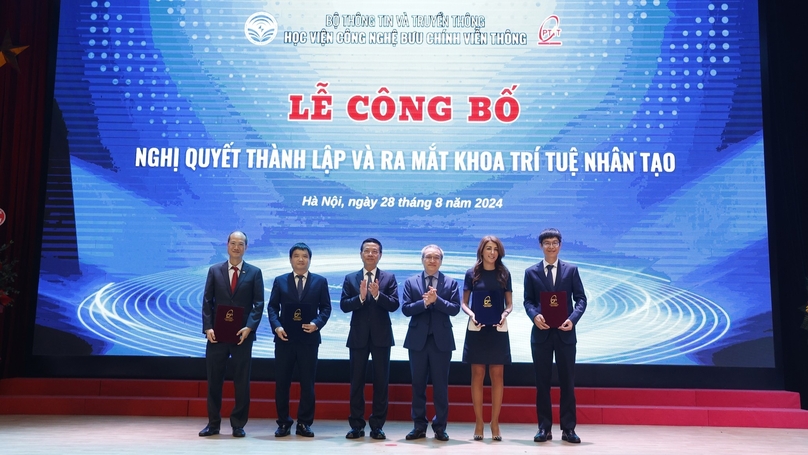 Rita Mokbel (second, right), head of Ericsson Vietnam, and Minister of Information and Communications Nguyen Manh Hung (left, third) at the launching ceremony of the AI faculty, Postal and Telecommunications Institute of Technology, in Hanoi on August 28, 2024. Photo courtesy of PTIT.