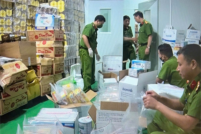 A police raid at the premises of Holland Milk JSC in Hanoi. Photo courtesy of the Ministry of Public Security.