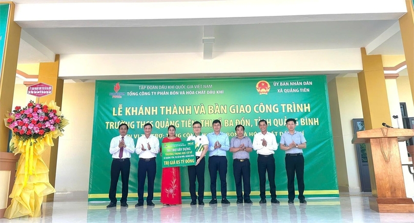 Representatives of PVFCCo hand over a classroom building the company sponsored to Quang Tien Secondary School in Quang Binh province, central Vietnam. Photo courtesy of the company.