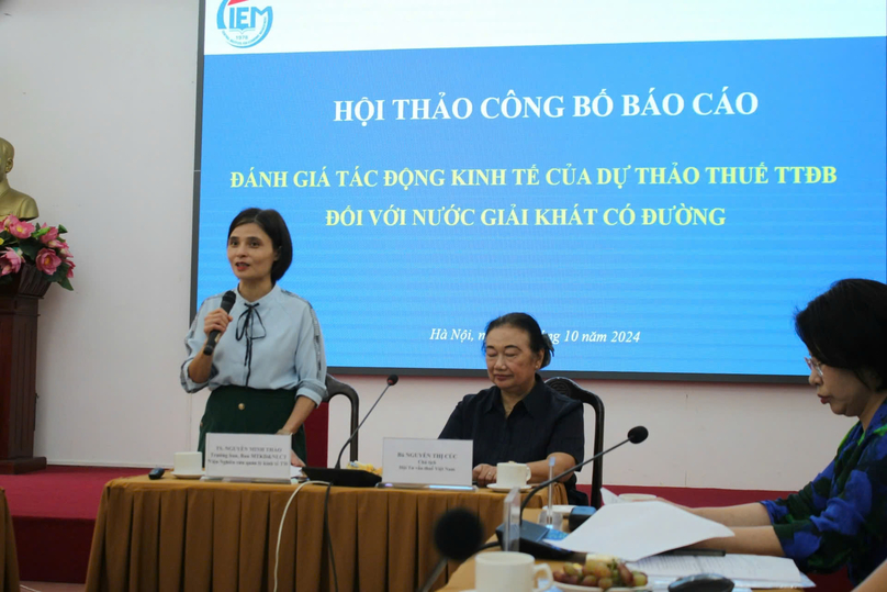 Dr. Nguyen Minh Thao (standing), head of the CIEM’s business environment and competitiveness research department, speaks on the release of a report on economic impacts of the draft excise law at a seminar in Hanoi, October 17, 2024. Photo courtesy of CIEM.