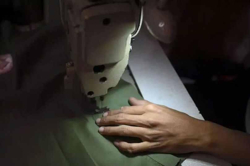 A worker works on a piece of clothing at a small-scale manufacturing in South Jakarta on September 30, 2024. Photo courtesy of Antara.