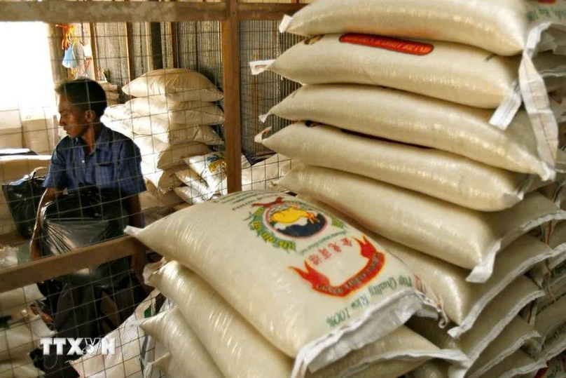  A rice store in Pekan Mundok town of Thailand. Photo courtesy of AFP/VNA.