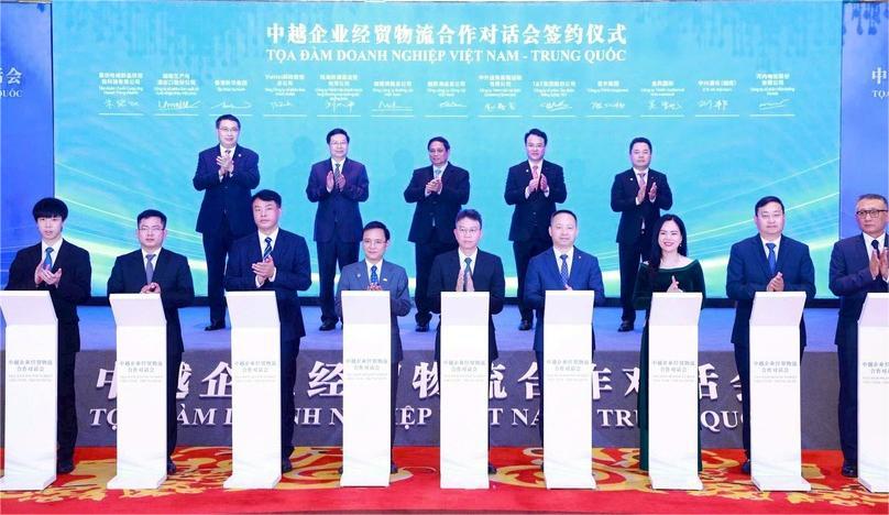 Nguyen Thi Thanh Binh (front, third, right), deputy general director of T&T Group, at an MoU signing ceremony within the Vietnam-China business forum in Chongqing, China, November 8, 2024. Photo courtesy of Vietnam News Agency.