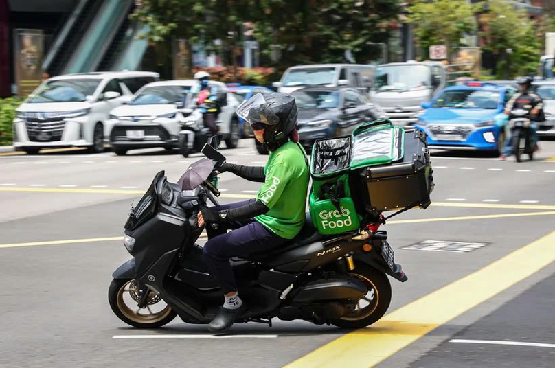 Grab expects its revenue for fiscal year 2024 to be in the range of $2.76 billion to $2.78 billion. Photo courtesy of The Business Times