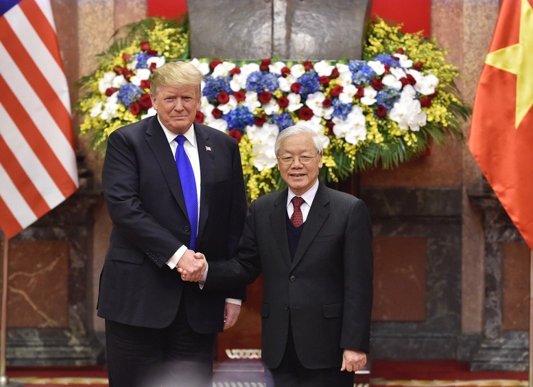 Vietnam’s then-Party General Secretary and President Nguyen Phu Trong shakes hands with U.S. President Donald Trump in Hanoi, February 27, 2019. Photo courtesy of the government’s news portal.