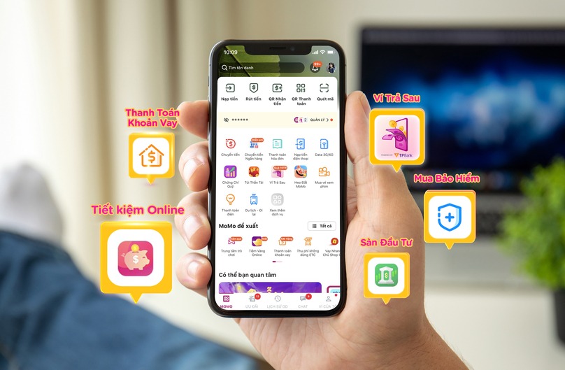  The MoMo app on a smartphone shows its digital wallet services in Vietnam. Photo courtesy of the firm.