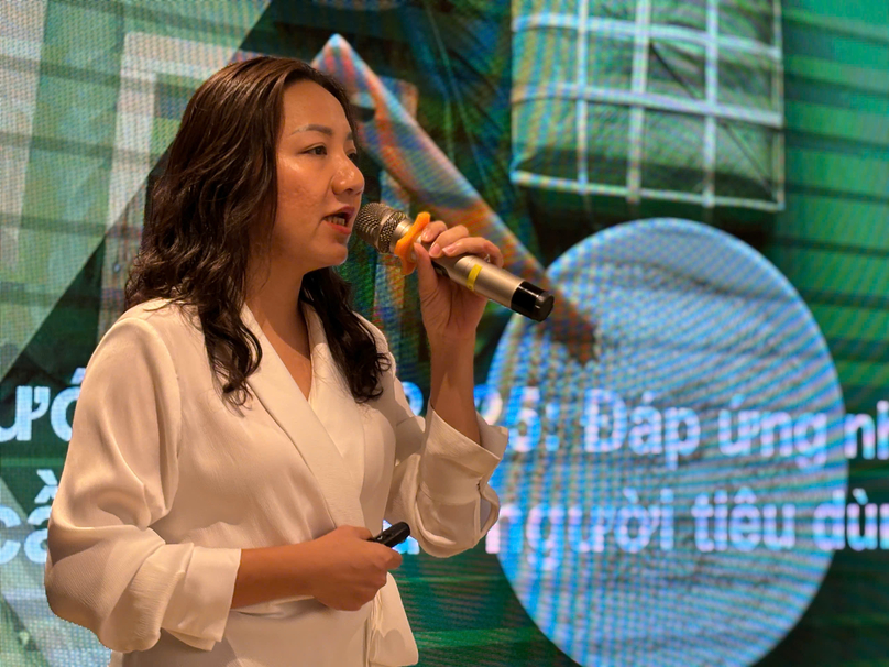 Nguyen Phuong Nga, business director at Kantar Worldpanel Vietnam, speaks at the 'Tet (Lunar New Year) shopping trends 2025' seminar in Ho Chi Minh city on December 2, 2024. Photo courtesy of the organizers.