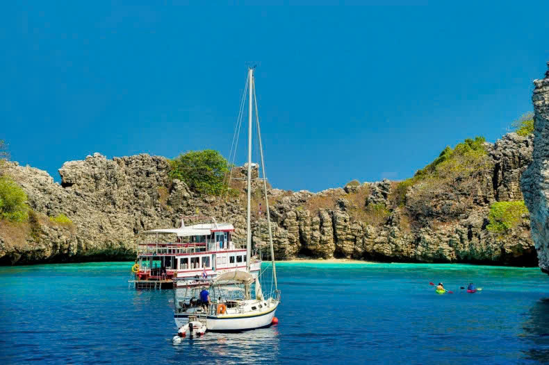  Boats anchor in an inlet at Koh Haa Island in Krabi. Photo courtesy of bangkokpost.com.