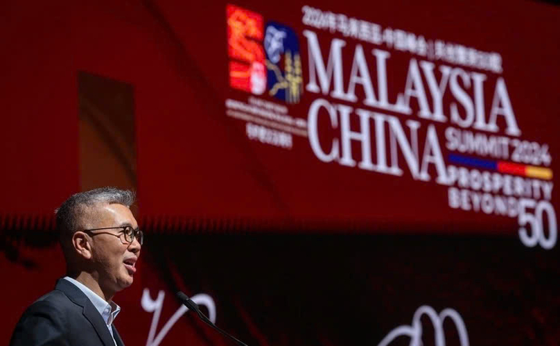  Malaysian Minister of Investment, Trade, and Industry Tengku Datuk Seri Zafrul Abdul Aziz addresses the Malaysia - China Summit 2024. Photo courtesy of Malaymail.