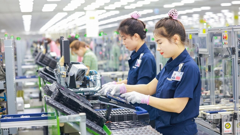 Samsung workers in Vietnam. Photo courtesy of Nhan Dan (The People) newspaper.