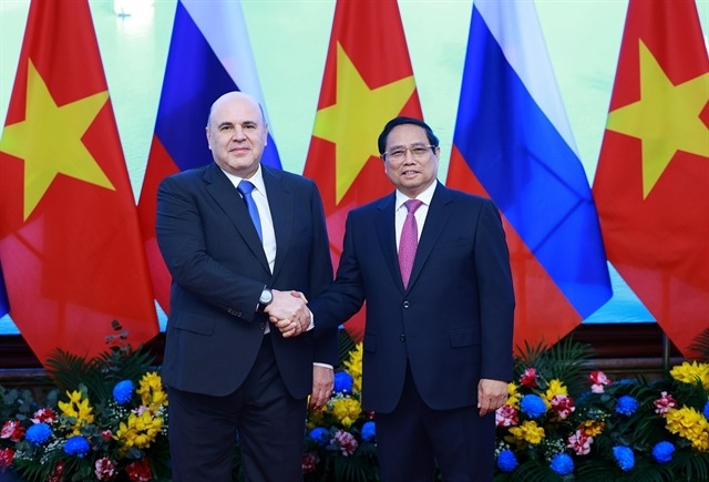 Prime Minister Pham Minh Chinh welcomes his Russian counterpart Mikhail Vladimirovich Mishustin on the latter's official visit to Vietnam, January 14, 2024. Photo courtesy of Vietnam News Agency.