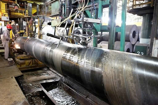 An employee finishes production of steel pipes at the Krakatau Steel plant in Cilegon, Banten. Photo courtesy of The Jakarta Post.