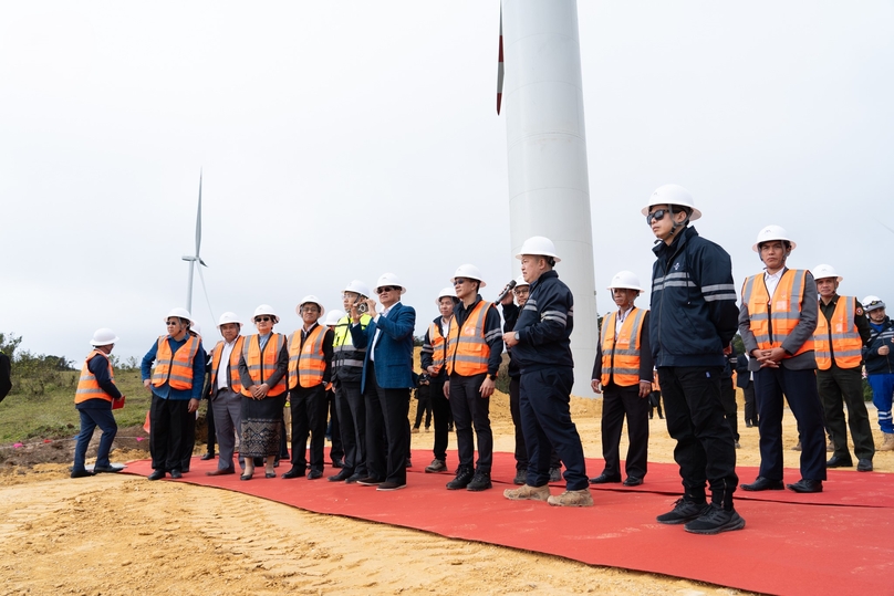 Laos' Party General Secretary and State President Thongloun Sisoulith (blue suit) visits the Monsoon wind power project in Laos, January 14, 2025. Photo courtesy of Monsoon Wind Power.