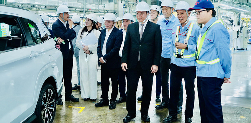 Vinh Phuc Chairman Tran Duy Dong (front, black suit) visits Toyato's factory in Vinh Phuc province, northern Vietnam, January 21, 2025. Photo courtesy of Vinh Phuc news portal.