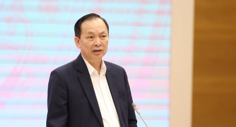 Dao Minh Tu, Deputy Governor of the State Bank of Vietnam, speaks at the government's regular meeting on February 5, 2025. Photo courtesy of the government's news portal.