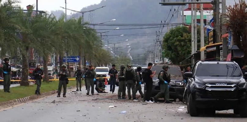 Security officials examine the bombing site in Bannang Sata district, Yala on February 23. Photo courtesy of Bangkokpost.