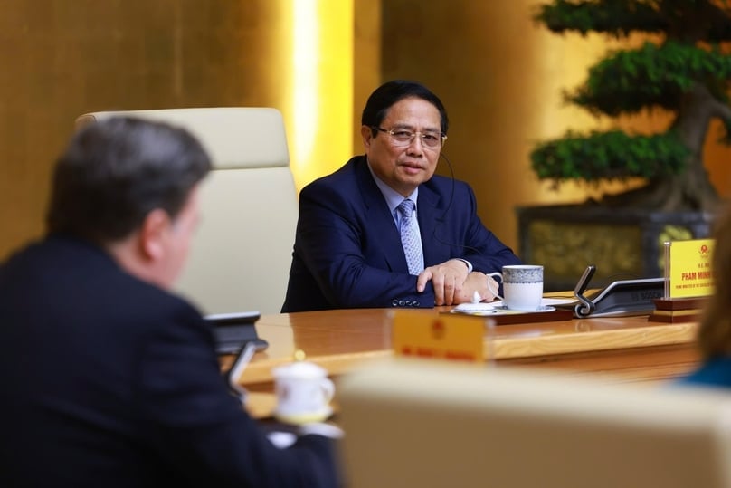 Prime Minister Pham Minh Chinh talks with U.S. Ambassador to Vietnam Marc Knapper in Hanoi on March 13, 2025. Photo courtesy of the government's news portal.