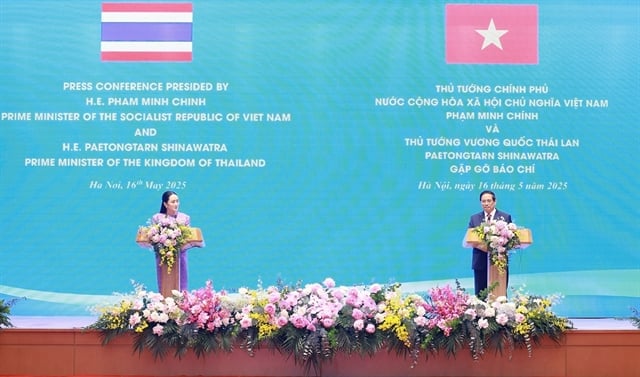 Prime Minister Phạm Minh Chính and his Thai counterpart Paetongtarn Shinawatra announce the elevation of Vietnam-Thailand relations to a comprehensive strategic partnership. Photo courtesy of Vietnam News Agency.