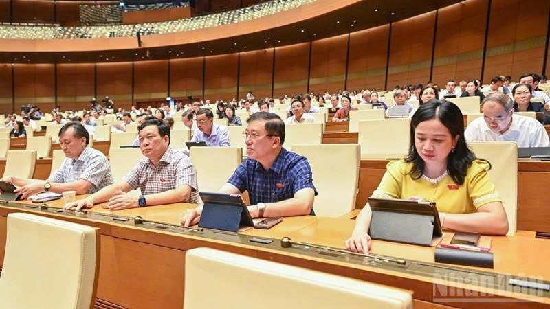 Vietnamese legislators press the button to pass the Excise Tax Law on June 14, 2025. Photo courtesy of Nhan dan (People) newspaper.