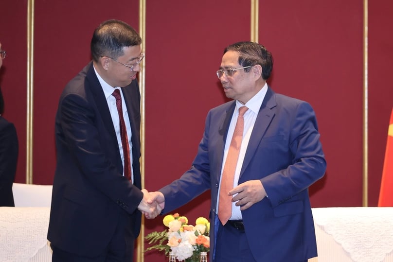 Prime Minister Pham Minh Chinh (right) receives Bank of China's chairman Ge Haijiao on June 24, 2025. Photo courtesy of the Vietnamese government's news portal.