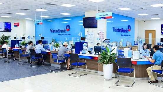 Customers make transactions at a VietinBank office. Photo courtesy of the bank.