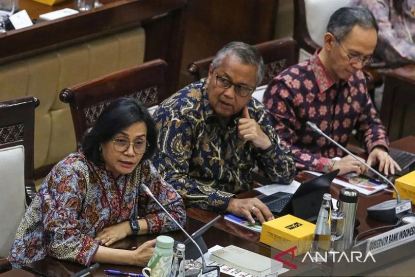Finance Minister Sri Mulyani Indrawati (left), Bank Indonesia Governor Perry Warjiyo (center), and Chairman of the OJK Board of Commissioners Mahendra Siregar (right) deliver their presentations during a working meeting with Commission XI of the Indonesian House of Representatives (DPR RI) at the Parliamentary Complex in Senayan, Jakarta on July 3, 2025. Photo courtesy of Antara.
