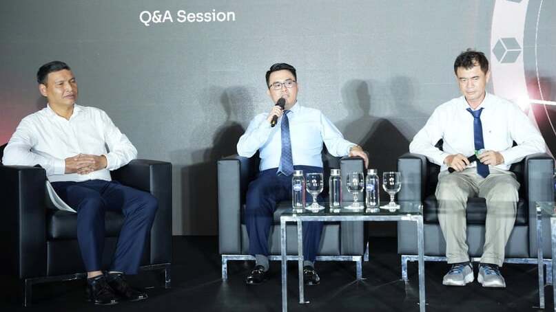 To Tran Hoa, deputy head of the stock market development department under the State Securities Commission (center) on the sidelines of the GM Vietnam 2025 event, August 1, 2025. Photo courtesy of the organizers.