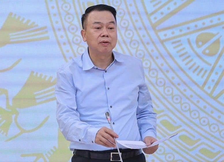 Deputy Minister of Finance Nguyen Duc Chi speaks at a monthly cabinet press meeting in Hanoi on August 7, 2025. Photo courtessy of the government's news portal.