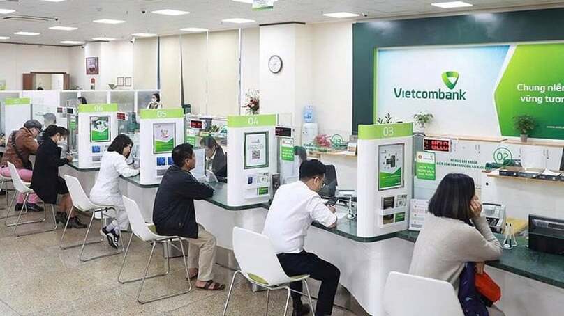 At a transaction office of Vietcombank. Photo courtesy of VNA.