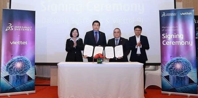 Representatives from Dassault Systèmes and Viettel pose for a photo after signing the MoU. Photo courtesy of Dassault Systèmes.