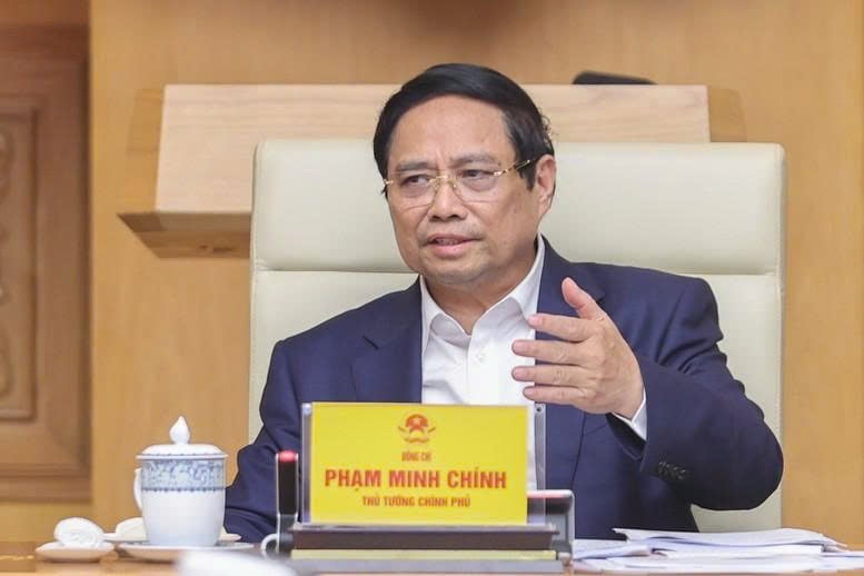 Prime Minister Pham Minh Chinh addresses the meeting. Photo courtesy of VNA.