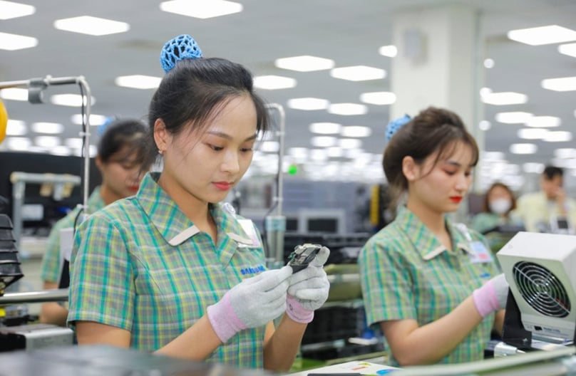 The current VND11 million ($417) monthly deduction for taxpayers is considered insufficient amid rising living costs. Photo courtesy of VietnamFinance.