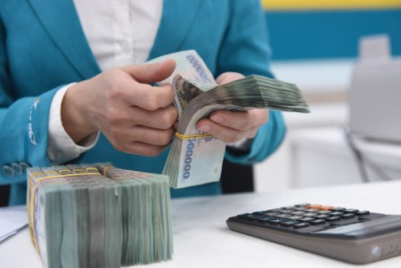 Sắp tới, ngân hàng sẽ giảm lãi suất cho người vay mua nhà. Ảnh minh họa