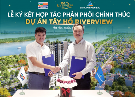 Ông Tô Chí Công (trái) và ông Vũ Cương Quyết tại Lễ ký kết.