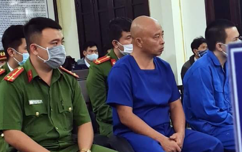 Hai bị cáo Đường và Tiến tại phiên toà.