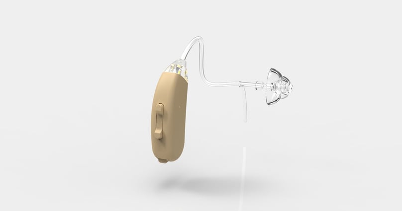 Máy trợ thính kỹ thuật số với micrô đi vào tai, được kết nối bằng một dây nhỏ với bộ khuếch đại và bộ pin được gắn vào tai.