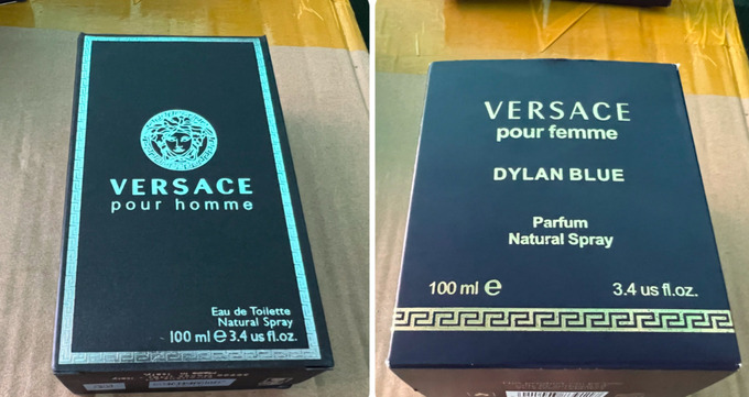 Chai nước hoa nhãn hiệu Versace nhưng không có giấy tờ chứng minh nguồn gốc xuất xứ, được phát hiện tại kho hàng của ông Phú. Ảnh: DMS