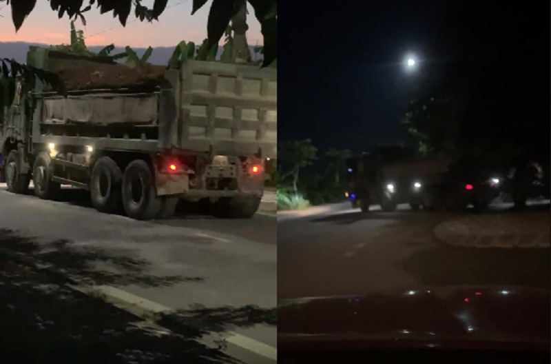 Xe tải chở đất thải từ dự án đi vào cổng sau nhà máy gạch Thạch Bàn - Đan Phượng để đổ sau đó đi ra. (Ảnh: Cắt từ clip).