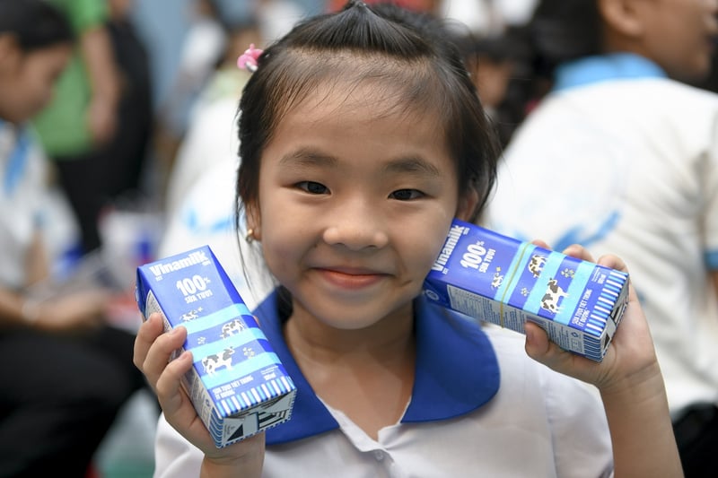 Nụ cười của các em nhỏ tại Làng Trẻ em SOS Bến Tre khi nhận những món quà từ Vinamilk và chương trình.