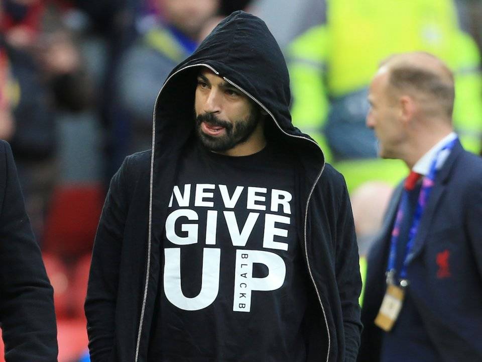Thông điệp “Không bao giờ bỏ cuộc” trên áo của Mohamed Salah (ảnh Getty)