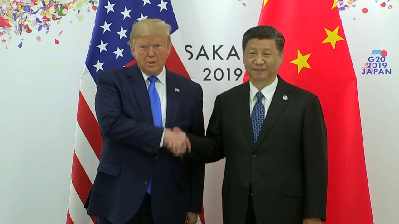 Hai nhà lãnh đạo Mỹ - Trung trước cuộc gặp tại G20 ngày 29/6.