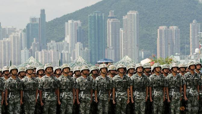 Các binh sĩ Trung Quốc tham gia một buổi biểu diễn trong một ngày mở cửa căn cứ hải quân Stonecutter ở Hong Kong hôm 30/6/2019.