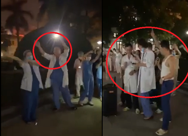 Hình ảnh các nhân viên Bệnh viện Bạch Mai đang tụ tập múa, hát mừng được dỡ cách ly hôm 10/4. (Ảnh cắt từ clip).