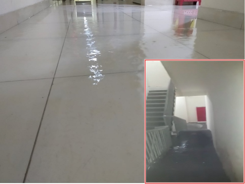 Hình ảnh nước mưa bì bõm tại tầng 20 (block D) Chung cư Tecco Town Bình Tân (TP HCM) - ảnh nhỏ là nước chảy xuống cầu thang. (Ảnh: Tieudung.vn).